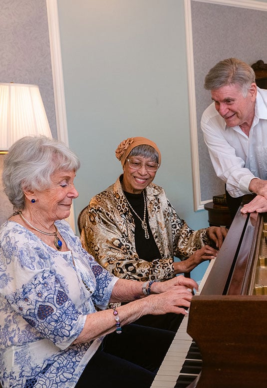 people playing the piano