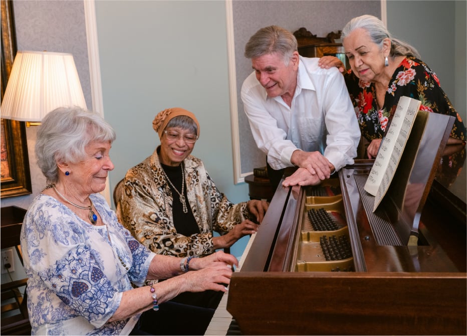 People playing a piano